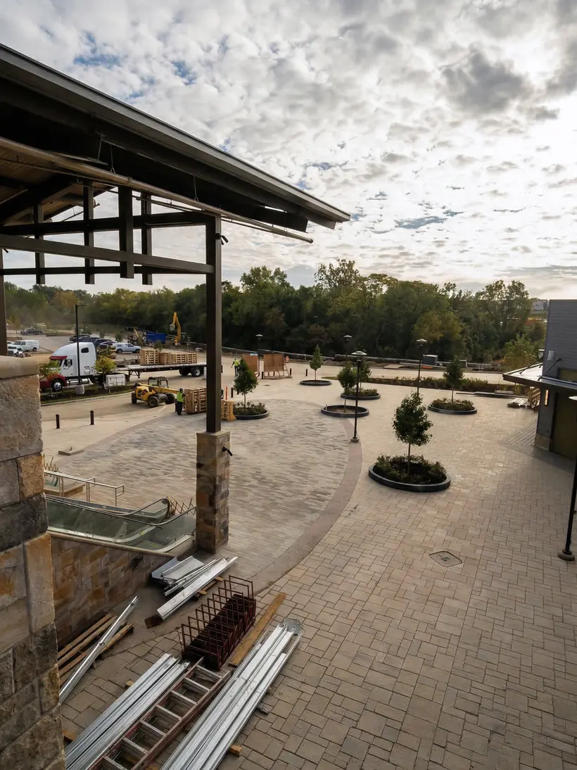 Pavilion plaza with new landscaping at dusk