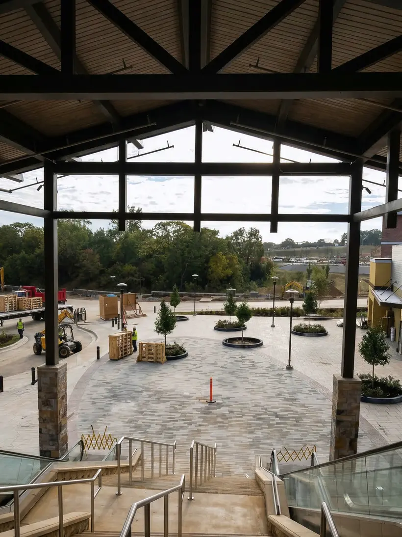 Inside a timber pavilion with young trees